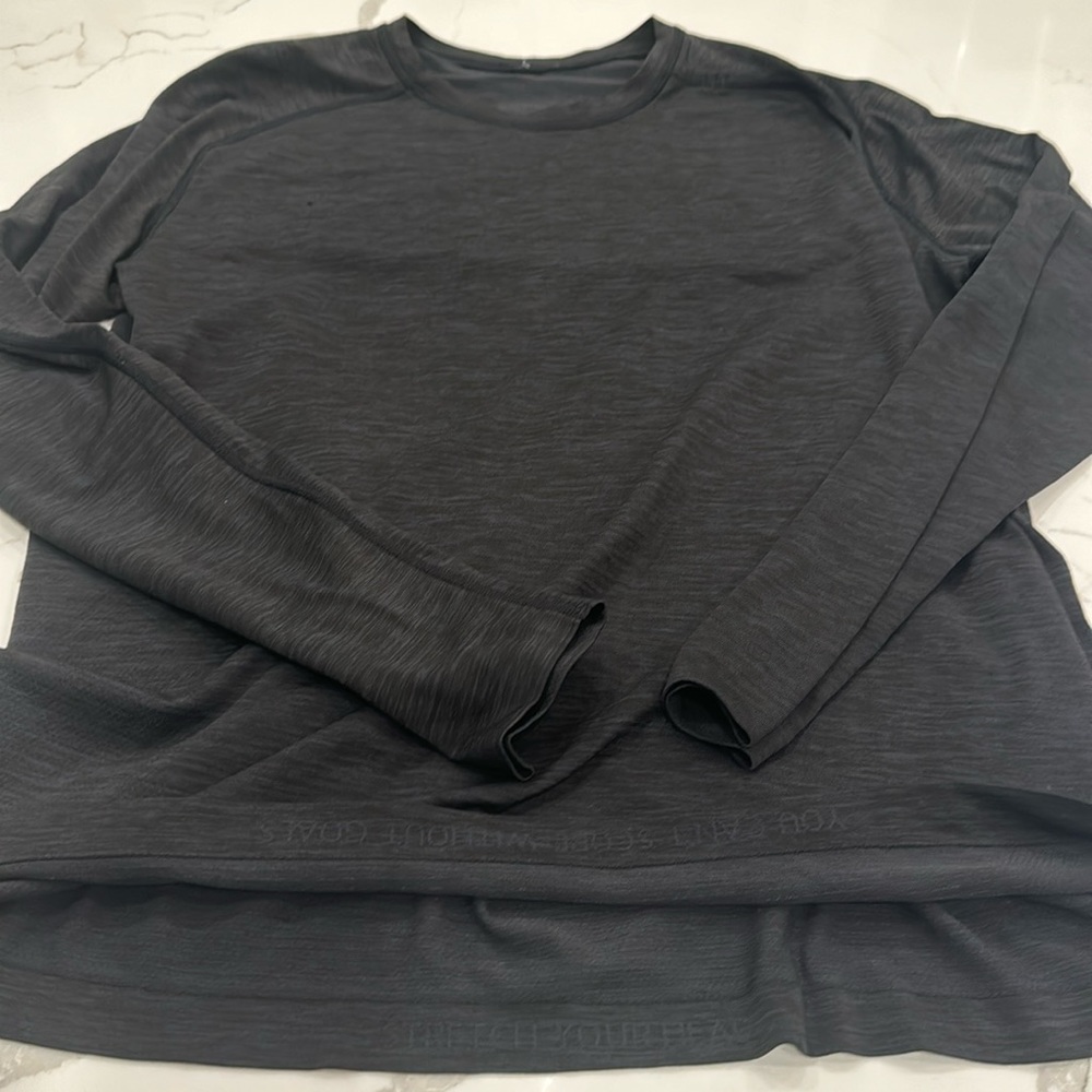 Lululemon. Men’s black, long sleeved, shirt.